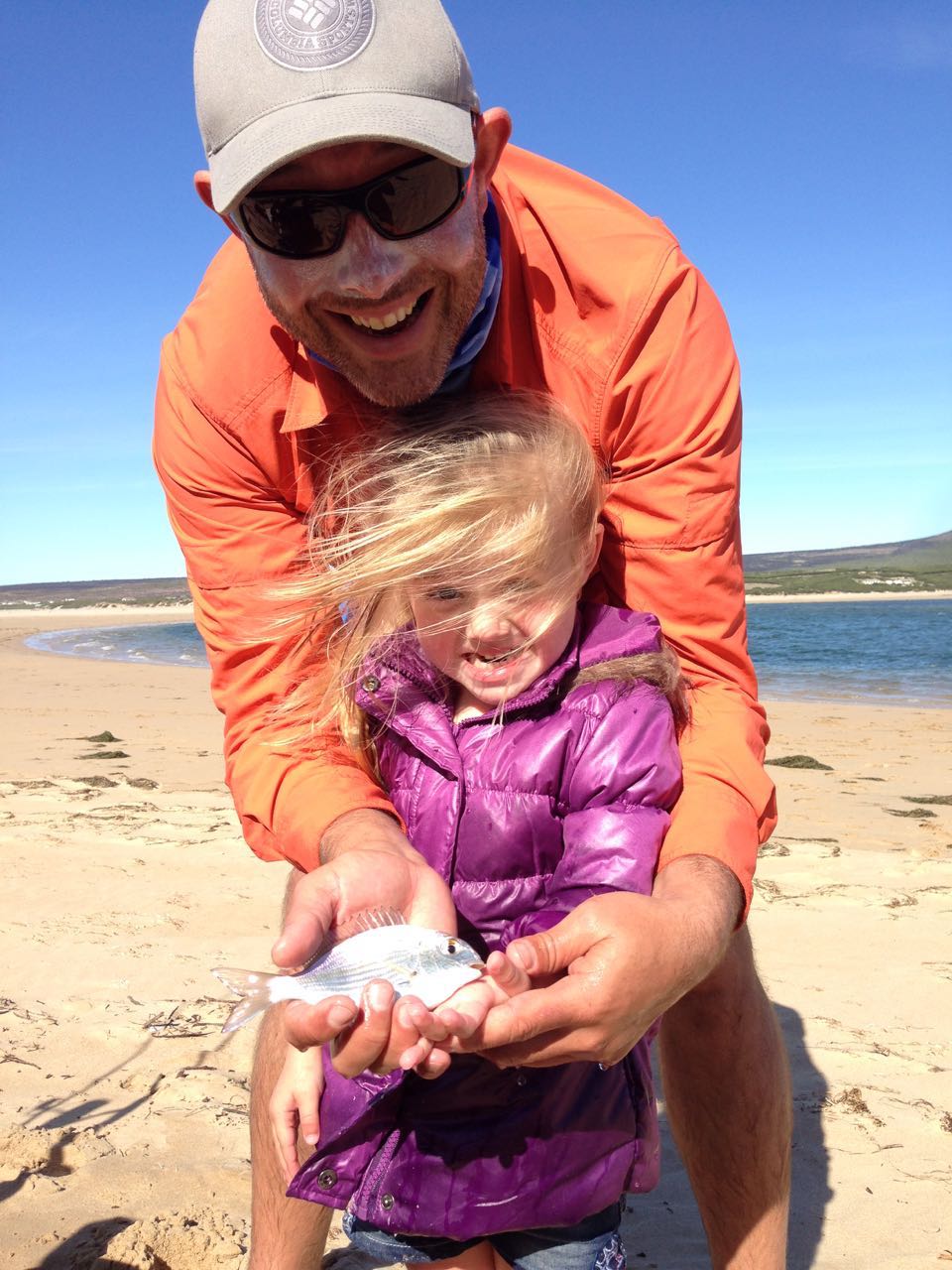 Heila with her first fish, a "vis stomp"
